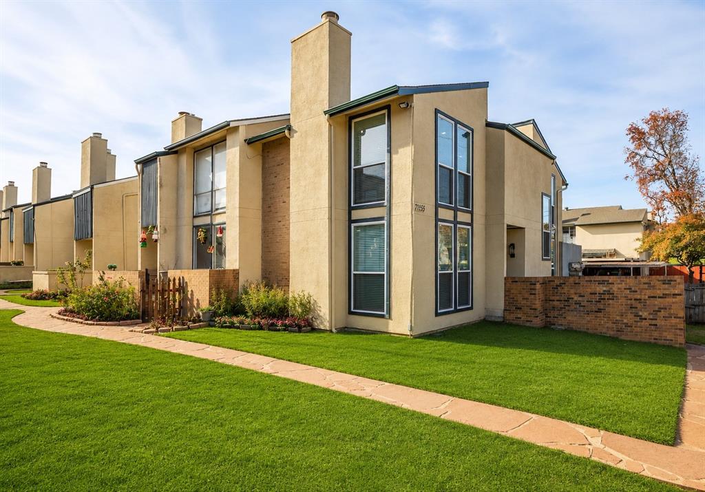 Modern and stylish 2-bedroom, 2.5-bath townhome in the heart of Northeast Dallas! This beautifully renovated home offers the perfect blend of comfort, luxury, convenience, and energy efficiency. Ideally located just minutes from NorthPark Center, Presbyterian Dallas, Highway 75, Loop 12, Downtown and Uptown Dallas, major employers, shopping, dining, schools, and entertainment. Light and bright throughout, this exceptional home features a high end finished out with beautiful, easy-maintenance, allergy-friendly wood flooring, a spacious open-concept living room with a fireplace, and a stunning KITCHEN with Granite Countertops, UPDATED CABINETRY, NEWER APPLIANCES, and MODERN FIXTURES throughout. The potential is endless in the oversized dining area provides flexible space for entertaining, a home office, fitness area perhaps another living area, or hobby area. The oversized family rm with 10ft ceiling, modern fixtures, LED lights, & WBFP is filled with natural light and is perfect for family gatherings. Upstairs, you'll find two oversized bedrooms, each with walk-in closets and beautifully updated ensuite bathrooms. Additional improvements include NEW DOUBLE-PANE ENERGY-EFFICIENT WINDOWS, NEWER HVAC system, NEW WATER HEATER, ADDED INSULATION, WOOD STEPS & WROUGHT IRON SPINDLES. The newer refrigerator, washer, and dryer will stay with the home. Enjoy outdoor living with a private fenced patio, a welcoming front porch, and two covered parking spaces. The HOA provides a no-maintenance lifestyle and includes water, sewer, community pool access, roof replacement, and foundation repairs. Move-in ready and within minutes to all amenities & has easy access to all major highways. This beautiful TH is a show stopper and a must-see to appreciate! See attached media for the complete list of upgrades.