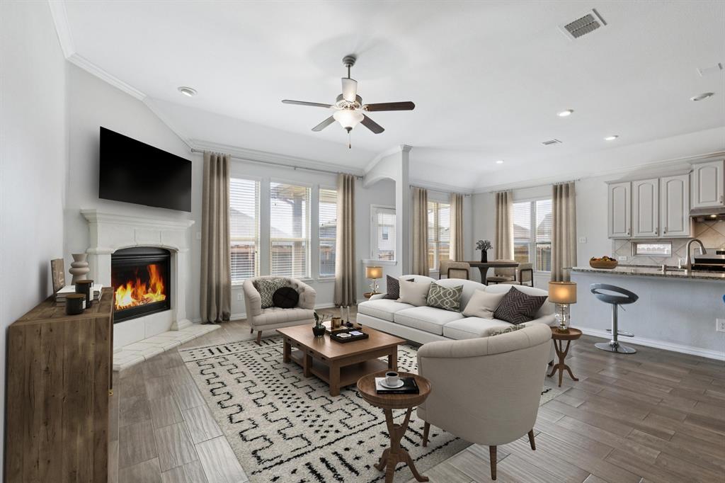 Priced below comparable homes, this beautifully maintained Sendera Ranch home offers a functional, move-in-ready layout with strong curb appeal and flexible living spaces. Bright, open interior with soft neutral tones and wood-look tile flooring throughout the main living areas. Formal dining connects seamlessly to the kitchen and breakfast space, ideal for everyday living and entertaining. The kitchen features a gas range, abundant cabinetry, walk-in pantry, and a large center island that opens to the inviting family room with a cozy fireplace.

Split primary suite tucked at the back offers privacy with a soaking tub, walk-in shower, dual sinks, and a spacious walk-in closet. Secondary bedroom and full bath downstairs provide the perfect setup for guests, multigenerational living, or a home office. Upstairs includes a large game room, dedicated media room, two bedrooms with walk-in closets and a Jack-and-Jill bath, plus an additional half bath for convenience.

Covered patio overlooks a spacious backyard with room to create your ideal outdoor space. Located in Sendera Ranch with access to pools, parks, walking trails, and community amenities, plus easy access to major highways, DFW Airport, shopping, dining, and Eagle Mountain Lake.