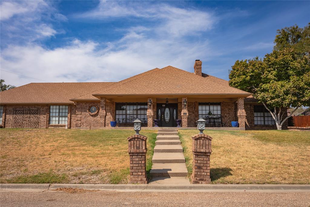 Gorgeous, updated brick home in super neighborhood. Beautifully remodeled with granite countertops, cabinets, stainless steel appliances, flooring, new central heat and air. The home has 3 bedrooms and 2 baths, plus a half bath in the spacious laundry room. There is one large living area with wood burning fire place, a formal dining room, a breakfast area, and a garden room overlooking the back yard. Master bedroom is oversize, and master bath has two separate vanities, and a separate tub and shower. This master suite has two very large walk in closets. The house has a 3 car garage with entry from the rear of the property. The garden room has a large screen TV with projection capabilities, with plenty of room for games, dining, and entertaining guests.  Nice back yard with privacy fencing. This home has been well maintained and is in move in condition.
