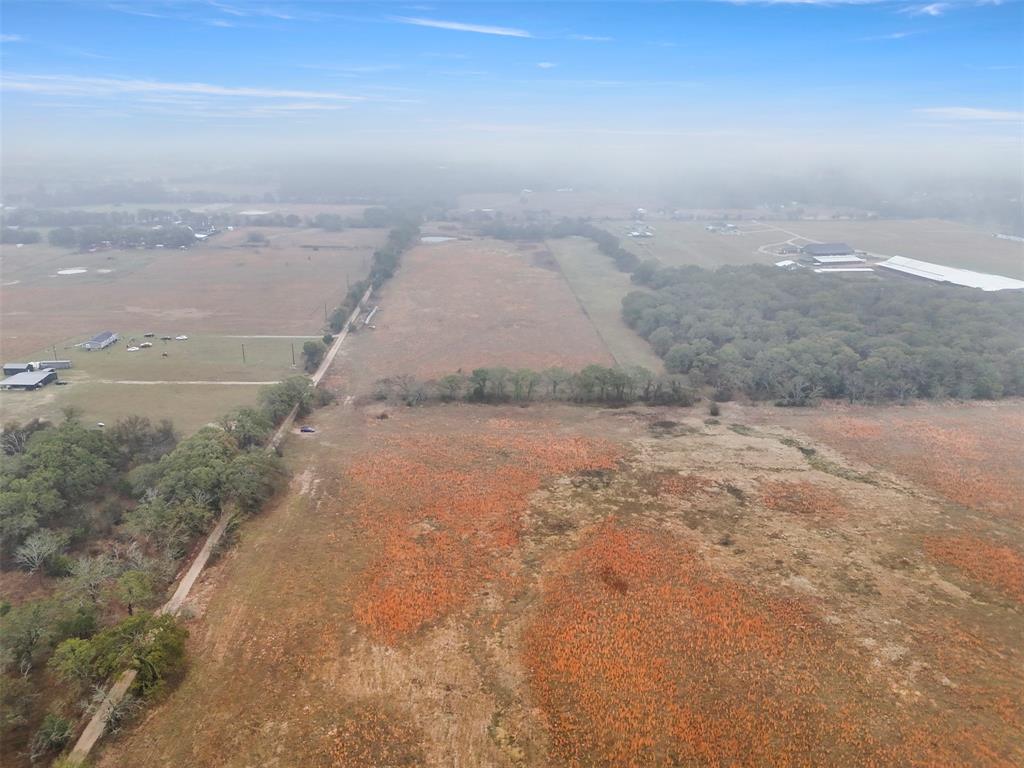 An ideal 10.03 acre setting for a personal or investment opportunity. Ideal for constructing your dream home—whether it's a modern barndominium, manufactured home, traditional single-family house, or ranch—this land offers great flexibility. It also presents excellent opportunities for ranching or agricultural activities, such as hay production. Enjoy the spacious surroundings, privacy, and the freedom to create a lifestyle tailored to your needs. Whether you're seeking a peaceful residence or a income-generating farm, this property provides endless possibilities.                                                               
** Save thousands of dollars by avoiding tree removal, as only a portion of the land has trees ** __ ** Only pay $20 in annual property taxes with the Agricultural Exempt **

Un terreno ideal de 10.03 acres para una oportunidad personal o de inversión. Ideal para construir la casa de sus sueños, ya sea un moderno barndominio, una casa prefabricada, una casa unifamiliar tradicional o un rancho, este terreno ofrece gran flexibilidad. También presenta excelentes oportunidades para la ganadería o actividades agrícolas, como la producción de heno. Disfrute de los amplios alrededores, la privacidad y la libertad de crear un estilo de vida a su medida. Ya sea que busque una residencia tranquila o una granja generadora de ingresos, esta propiedad ofrece infinitas posibilidades. **Ahorre miles de dólares evitando cortar árboles, ya que solo una parte del terreno tiene árboles **__
**Pague solo $20 en impuestos anuales de propiedad con la Exención Agrícola**