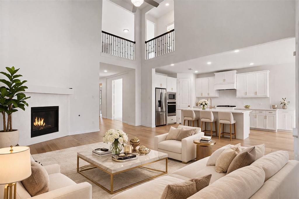 Relocating to DFW? Welcome home. Nestled in the highly sought-after Union Park community in Little Elm, this stunning 2022-built home offers the perfect combination of space, layout, and location for buyers making the move to North Texas.
Positioned just ~15 minutes from PGA Frisco and minutes from the highly anticipated Universal theme park opening in 2026, you'll be at the center of one of the fastest-growing and most exciting corridors in the entire DFW metroplex. Major corporate employers along the Legacy Corridor — including Toyota and Liberty Mutual — are within easy reach, and Downtown Dallas and Plano are just 30–40 minutes away, making this an ideal base for hybrid and remote professionals.
Inside, the home delivers 3,301 sq ft of thoughtfully designed living space across two floors. Soaring vaulted and cathedral ceilings greet you at the entry, opening into a light-filled layout built for both everyday living and entertaining. The main floor features a private guest bedroom with full bath — ideal for visiting family or a live-in relative — plus a dedicated study behind French doors. The open kitchen impresses with a gas cooktop, large island, and walk-in pantry, flowing seamlessly into the main living area. Upstairs, enjoy a spacious media room, game room, and loft alongside three additional bedrooms.
Union Park is more than a neighborhood — it's a lifestyle. Resort-style pools, splash pads, a fitness center, jogging trails, dog parks, and frequent community events make it one of the most amenity-rich communities in Denton County. Top-rated Denton ISD schools, including Navo Middle School, are within walking distance.
Vacant and move-in ready. All loan types welcome.