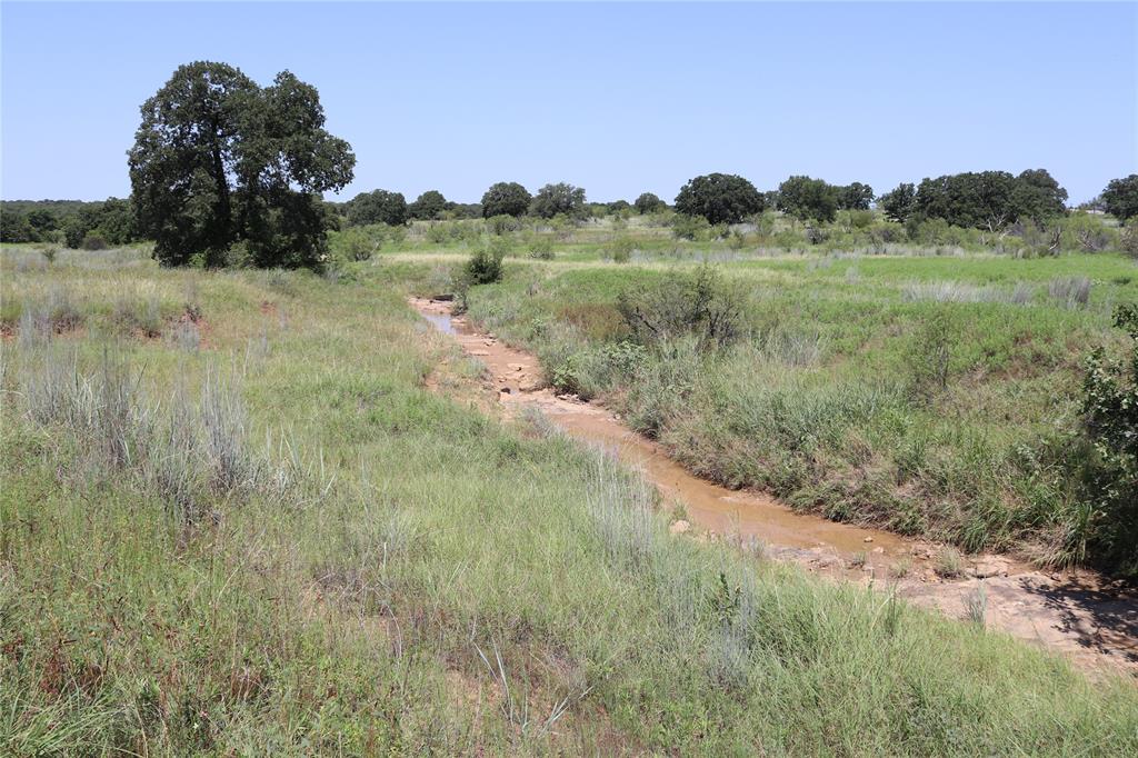 293 Acres Lapland Ranch. Incredible Hunting & Recreational property straddling the Clay & Jack County Line. You can see for miles from the High Elevation points ranging up to 1095 feet dropping off into timber lined creek bottoms. The perfect place for your dream home, weekend barndo or just RV camping with electricity on site! Old water well may be able to be rehabbed. 7 stock ponds. Big Oak timber with native grass clearings. Rolling topography. Excellent wildlife habitat with large plum thickets and dense timber for cover. Cross fenced for rotational cattle grazing. Sandy loam soil with cleared fields for cultivation perfect for planting wheat or improved coastal grass for hay.
20 minutes to Jacksboro, 45 Minutes to Wichita Falls and 90 minutes to Fort Worth. Great rural community & schools. No better place in North Texas to raise a family or retire to the country!