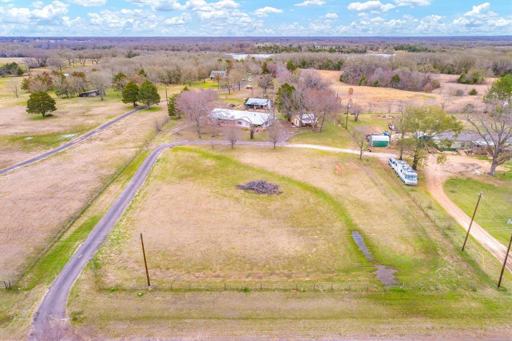 IF YOU LIKE TO LIVE A QUIET LIFE WITH OUT TO GO SO FAR AWAY AND PAY A FORTUNE OF MONEY,THIS IS THE ONE FOR YOU, SINGLE-WIDE WITH ALMOST 3 ACRES OF LAND,BARN,2 ELECTRIC METERS,SEPTIC TANK,PARTIALLY FENCED,VERY NICE PAVED  DRIVE WAY,THIS PROPERTY HAVE A SMALL HOUSE WHERE YOU CAN RENT IT OR LIVE IN IT,THE BIG YARD WITH SOME TREES ARE READY FOR YOU TO HAVE A LOT'S OF FAMILY TIME, THE NEIGHBORDS ARE ALL FAMILIES AND VERY FRIENDLY,PLEASE DON'T LET THIS ONE GO BY WOUN'T LAST LONG.