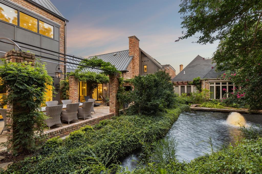 Welcome to your fully renovated oasis at 25 Lakeside Park in Dallas, Texas. This stunning home has just undergone a complete renovation throughout, including new windows, floors, kitchen, bathrooms, plus HVAC, electrical, mechanical and roof, ensuring a luxurious and modern living experience. With a downstairs master and guest room, along with two additional bedrooms upstairs + gym with full bath, this home offers both convenience and privacy. The gym could easily be converted to a 5th bedroom. Additionally, a new whole house security system and AV with speakers. The beautiful outdoor living setting on the treed lot is highlighted by a serene water feature running down the side and rear of the property, creating a tranquil and picturesque atmosphere. Lakeside owners have access to the clubhouse on Cornerstone Parkway, which has a pool, workout room, and tennis courts.