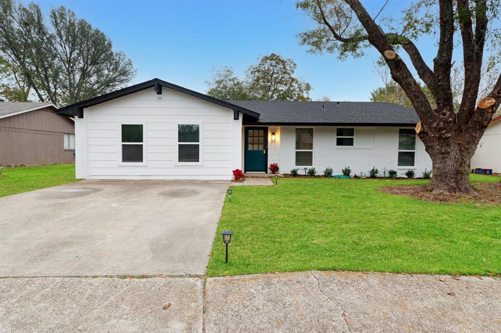 Come home to your beautifully remodeled home on third of an acre only 7 minutes from downtown.  Nearly everything is brand new, shows like a model. All new roof, windows  landscaping and new central heat and air.  You'll love the large  Kitchen that  has  new beautiful  white cabinets with 2 lazy susans and quartz countertops and new  dishwasher, stove, vent a hood and penisula. Enjoy the designer like bathrooms with all  new fixtures, and ceramic tile  
The garage was converted to  extra large den for a second living area. Backyard features a new covered patio with plenty of light to relax and look over large yard with storage building. Home is vacant and ready for immediate occupancy.  Great location only minutes to UNT & TWU & downtown Denton.