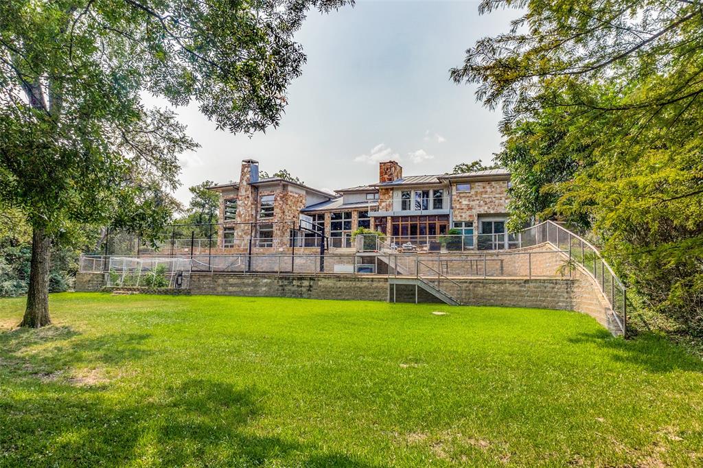 Grand home custom built by English Heritage Homes. A timeless construction with gallery room dining and floor to ceiling windows in main living.  This home has all of the bells and whistles including 4 fireplaces, 2 laundry rooms, wet bar, office, study, work out room, gourmet kitchen with stainless steel appliances and expansive pantry.  Upstairs primary bedroom has a private sitting area with fireplace and deck. All bedrooms have a private bath.
The 1.72 acre backyard is a tree wooded paradise adjacent to the White Rock Trail. Also included is a screened porch with built in grill, fire pit, swimming pool, sport court, sprinkler system, and Mosquito Nix system.
This amazing home is complete with standing seam metal roof, 5 Trane HVAC units, Cat 5 wiring, and a 3 car garage. 
A one of a kind estate on an outstanding lot in the Strassbourg Estates.  All showings are agent to meet.