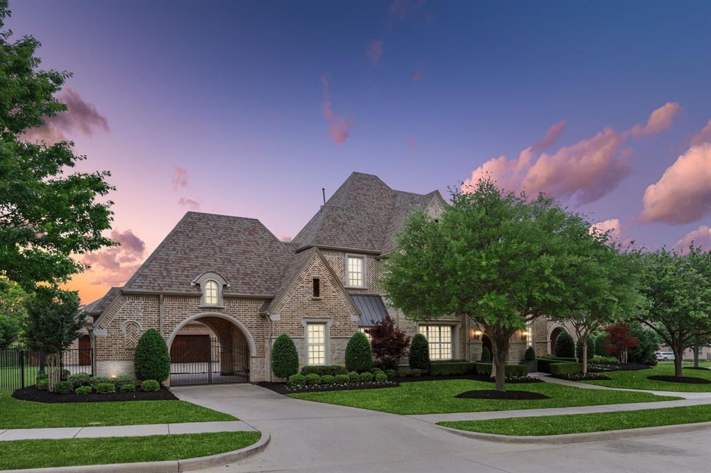 Luxurious custom estate with gated entry set on a premium .7-acre lot with mature trees for privacy & designed to entertain on a grand scale. Elegant architectural design with soaring beamed ceilings, impressive moldings, solid doors & intricate lighting throughout. Formal dining with wine bar leads to your family room with floor to ceiling doors to outdoor living and flows to your large breakfast room & gourmet kitchen with Viking 6-burner range, double convection, subzero, large center island & fully equipped prep kitchen with double oven, wine fridge, sink, second dishwasher, double fridge & freezer drawers. The primary suite is tucked away with coffee bar & stunning double spa bath. First floor guest suite, executive office & exercise room are perfectly placed for privacy and separation. A grand staircase provides access to game room, wet bar, media room & 3 ensuite bedrooms. Exquisite outdoor retreat with covered patios, grill & bar, tranquil pool, spa & landscaped to perfection.
