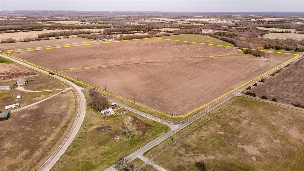 60.57 acres in Bells, TX positioned directly in the path of North Texas growth. Located just north of Tom Bean and southeast of Sherman, this tract offers road frontage on two sides, providing excellent access and flexibility for future development or investment. Grayson County continues to see strong expansion, with population growth of over 30% since 2010 and steady in-migration from the Dallas-Fort Worth metroplex. Nearby Sherman is emerging as a major economic hub, fueled by significant corporate investment including the $30 billion Texas Instruments semiconductor project, expected to bring thousands of jobs to the area. This surge in employment and infrastructure is driving housing demand and accelerating development throughout the region. As growth continues pushing north from DFW, properties in the Bells, Tom Bean, and Sherman corridor are becoming increasingly attractive for developers and long term investors. The size, location, and dual road frontage make this property well suited for a variety of uses, including residential development, ranchettes, or a buy and hold investment positioned for future appreciation. With proximity to major highways, expanding job centers, and one of the fastest growing regions in North Texas, this tract offers both immediate usability and long term upside. Opportunities like this are becoming more limited as development continues to move north secure your position in the growth path while land is still available.