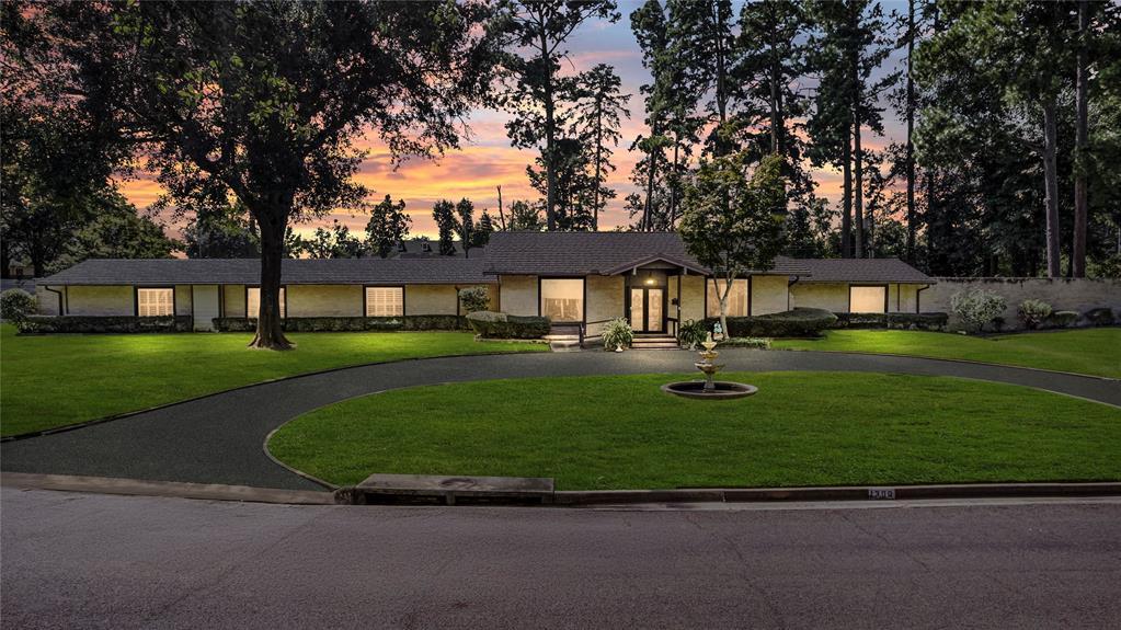 Welcome to 1300 Montclair, a stunning reimagined mid-century home in the heart of Longview. This 4,244 sq. ft. residence blends timeless style with modern luxury. Inside you’ll find 3 spacious bedrooms (plus flex for a 4th), 2 full baths, 2 half baths, and 3 fireplaces. The show-stopping great room opens to the backyard through a dramatic accordion glass wall, creating seamless indoor to outdoor living.

The chef’s kitchen features a massive island with 3 sinks and 2 dishwashers, Monogram fridge-freezer, 6 burner cooktop with griddle, pot filler, and double ovens. The expanded primary suite offers a cozy fireplace, spa inspired bath, closet island, and convenient in suite laundry. A converted 3 car garage creates a huge game room or optional 4th bedroom with its own HVAC and fireplace.

Step outside to enjoy the renovated saltwater pool, generous backyard, and multiple patios designed for gatherings. Practical upgrades include a whole house generator, 3 HVAC units, updated windows, Hardie eaves, and abundant storage with 2 exterior buildings. Ample driveway parking with gate potential adds extra convenience.

This thoughtfully updated home combines architectural character, premium finishes, and modern efficiency in one rare package.