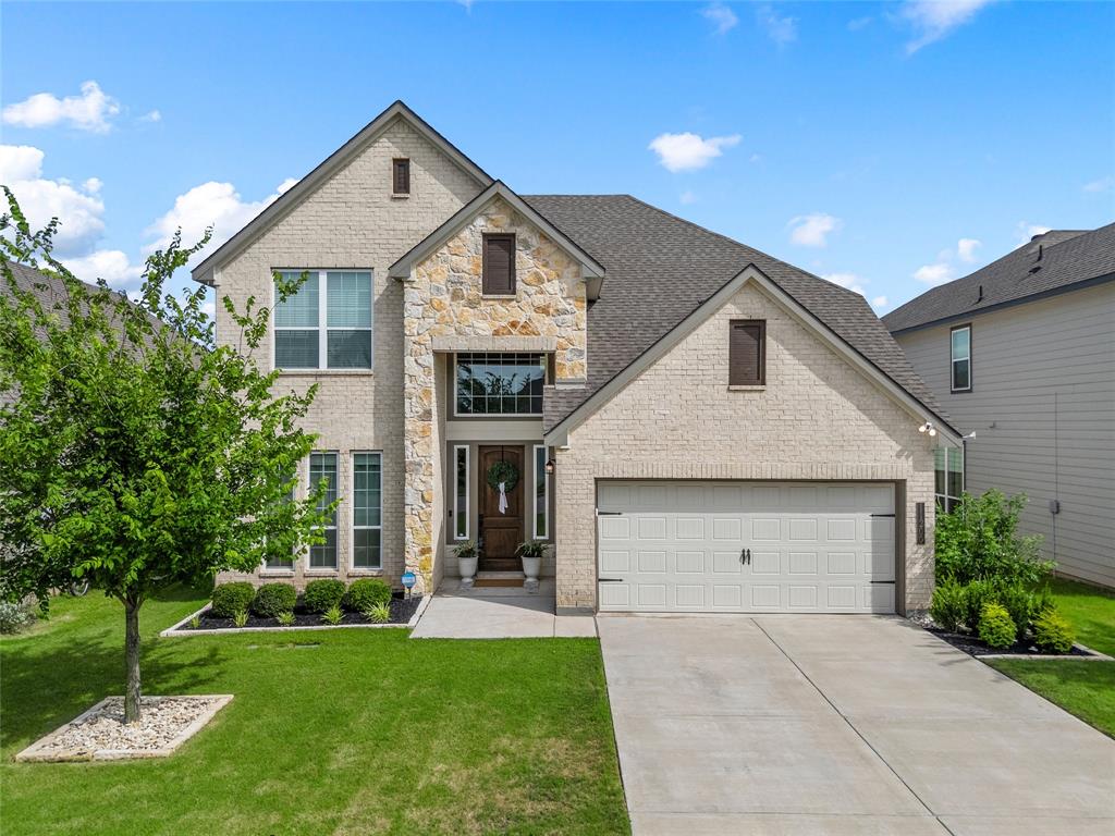 Welcome home to this picture-perfect two-story beauty in the highly desirable Midway ISD! From its charming curb appeal to its thoughtfully updated interior, this home is designed for comfortable everyday living with timeless style. Step inside to a light-filled, open floor plan where every space feels warm, inviting, and effortlessly connected.

The welcoming entry leads into a spacious dining room before opening to the stunning living area, where a beautifully added fireplace creates the perfect focal point for gathering with family and friends. The designer kitchen is sure to impress with granite countertops, an oversized island, an updated backsplash, under-cabinet lighting, stylish cabinet hardware, a walk-in pantry, quality appliances, and beautiful light fixtures that complete the modern look.

The private downstairs primary suite is a true retreat, featuring a spa-inspired bathroom with an oversized walk-in shower, relaxing soaking tub, dual vanities, and a generous walk-in closet. You'll also appreciate the convenient first-floor laundry room and guest half bath.

Upstairs offers an ideal layout with three spacious secondary bedrooms, two full bathrooms, and a versatile bonus living area perfect as a media room, game room, playroom, home office, or hobby space. An oversized attic access at the top of the stairs provides exceptional storage that's both convenient and functional.

Step outside to enjoy the covered patio overlooking the fully fenced backyard—an ideal setting for weekend barbecues, entertaining guests, or simply relaxing while the kids and pets play. Additional features include a front and back sprinkler system, Ring security system, blinds throughout, and a two-car front-entry garage.

Located in sought-after Park Hill Elementary and Midway ISD, with annual HOA dues of just $450, this move-in ready home offers the perfect combination of style, space, and everyday comfort.