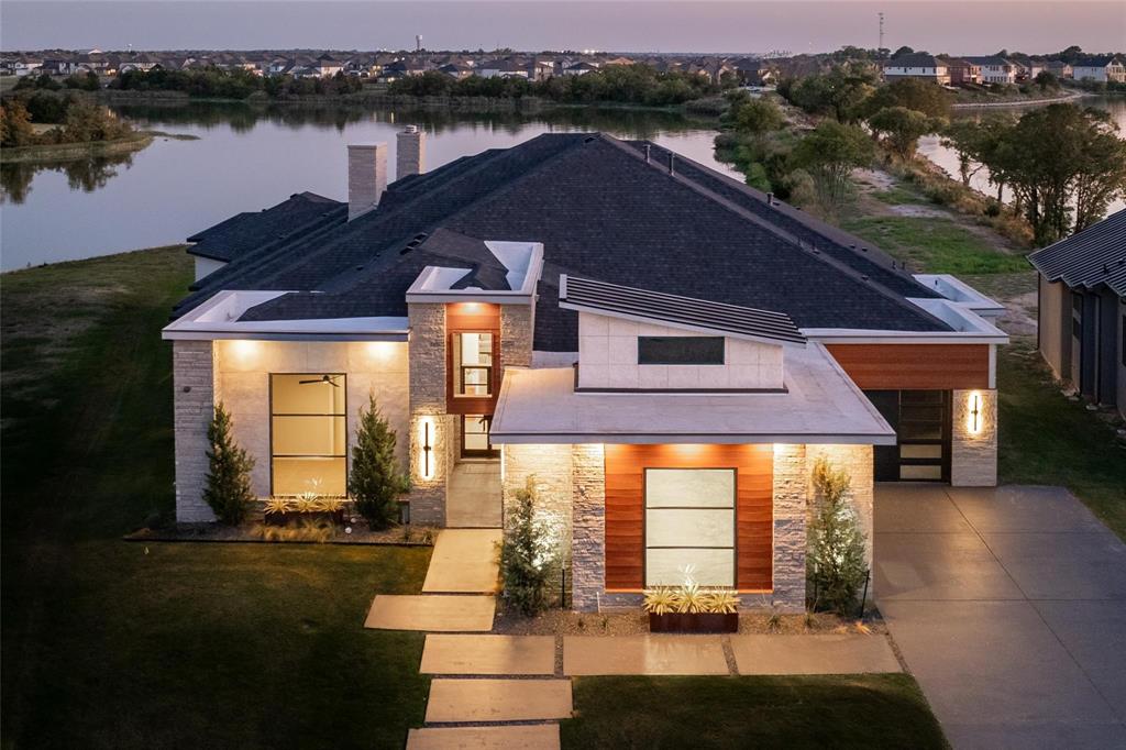 Welcome to 1954 Noe Blvd, an exquisite property that perfectly captures the essence of luxurious lakeside living in Heath, Texas. Situated directly across from the prestigious Heath Golf and Yacht Club and overlooking the serene waters of Lake Ray Hubbard, this home offers unparalleled access to a lifestyle filled with recreation and relaxation. As you enter this stunning residence, you are greeted by a bright and spacious open floor plan that combines elegance and functionality. The expansive living area features large windows that frame picturesque views of the lake, filling the space with natural light. The modern kitchen, equipped with high-end appliances, granite countertops, and a convenient breakfast bar, is perfect for culinary enthusiasts and entertaining guests. This beautiful home includes four spacious bedrooms, including a sumptuous primary suite that serves as a personal retreat. The luxurious ensuite bathroom features dual vanities, a soaking tub, and a separate shower, creating a spa-like atmosphere for unwinding after a long day. Step outside to your private backyard oasis, where you can enjoy outdoor entertaining or simply take in the tranquil views of Lake Ray Hubbard. With the clubhouse, tennis courts, boat docks, and golf course just moments away, you’ll have endless opportunities for leisure and recreation right at your doorstep. This property is located in a vibrant community that offers a wealth of amenities, making it ideal for families and active individuals alike. Don’t miss out on the chance to call 1954 Noe Blvd your home. Schedule a showing today and experience the perfect blend of luxury and lakeside living!