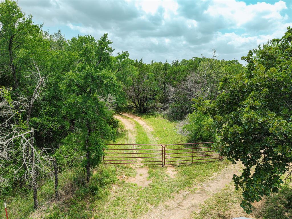 Bring your vision to this 6.18-acre property in the peaceful Cleburne countryside. This tract offers plenty of space for a future homesite, weekend getaway, recreational use, or private country retreat. Enjoy the quiet setting, open land, and room to spread out while still being within driving distance of Cleburne conveniences.

A small one-bedroom primitive cabin is located on the property and will stay with the sale. The cabin has no utilities currently connected and is being sold as-is. Storage containers currently on the property will be removed by the seller prior to closing.