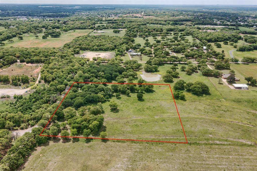Rare opportunity to own an absolutely gorgeous 6.1 acre lot just outside the city limits of Burleson. The lot offers a mix of beautiful mature trees and open areas with great options for a build site. The property is located in a secluded area surrounded by beautiful ranchettes.  This location offers the benefit of town and country with all the conveniences of the city just minutes away.  Less than a 10 minute drive to access I-35 or Burleson Town Center, and a quick 30-minute drive to downtown Fort Worth. Bring your own builder to build your dream home or barndominium in the highly desired Burleson ISD. Property is lightly deed restricted with NO HOA! The property is outside of the city limits, which means no city property taxes! Additional acreage available.