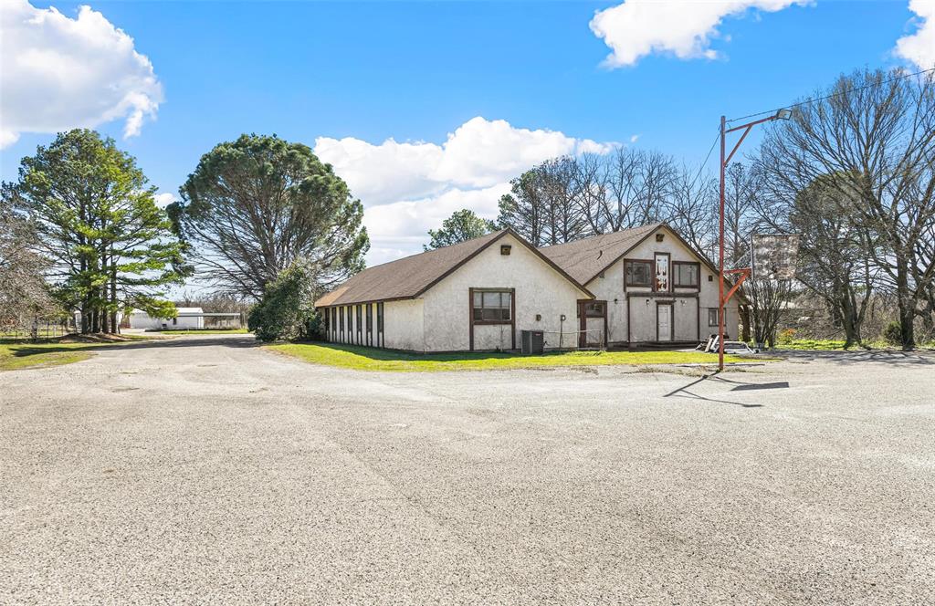Heavy Commercial Zoned Building, with a total of approximately 7 acres previously used as a church. Currently being used as a commercial office space. City water, city sewer, large acreage. Great location for a redevelopment.