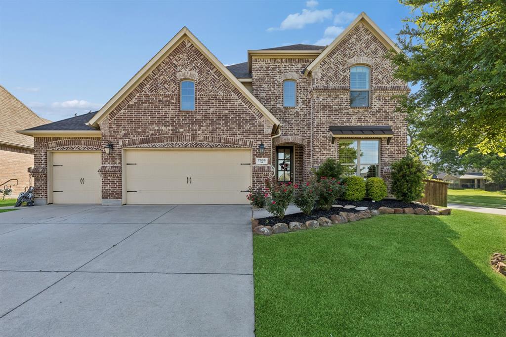 Welcome to this stunning modern home in the highly sought-after Trinity Falls community, nestled on a rare corner cul-de-sac lot adjacent to a lush greenbelt. From the moment you step inside, soaring 18-foot ceilings, spiral staircase, rich hardwood floors, and a dramatic floor-to-ceiling stone fireplace set the tone for the designer-curated upgrades found throughout. The open-concept layout seamlessly connects the living, dining, and kitchen spaces — ideal for entertaining. The chef's kitchen impresses with marble countertops, a glass tile backsplash, stainless steel appliances, and a 5-burner gas cooktop. The main floor also features a spacious primary suite with a luxurious en suite bath and walk in closet, plus a private guest bedroom downstairs with its own full bathroom. Upstairs, enjoy a game room, media room, and generously sized secondary bedrooms. Plantation shutters and motorized blinds add a polished finishing touch throughout. Full house water and filtration system and reverse osmosis drinking water in kitchen. Step outside and enter your own private oasis — a breathtaking backyard retreat designed for those who love to live and entertain outdoors. The resort-style pool stuns with elegant fire bowls and a cascading waterfall! Putting green, full outdoor kitchen, and covered patio with a cozy fire pit complete a backyard that truly has it all. Fresh landscaping and new luxury tile around the pool. Privacy fencing ensures the space feels like an exclusive escape, no matter the occasion. Don't overlook the extensive attic storage and the 3-car garage with upgraded epoxy flooring. As a Trinity Falls resident, you'll also enjoy community amenities including a beach-entry pool, splash pad, playgrounds, dog park, fitness center, and scenic hike and bike trails.