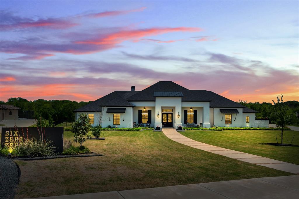 Amazing single-story custom home in the highly sought after community of Heath Crossing. This one of a kind home is located on a sprawling 2.06 acre lot complete with pool & spa, outdoor kitchen, in-ground trampoline, and fire pit. Every room has been meticulously designed with the most current features. This open concept home is truly an entertainers dream with a show stopping kitchen complete with a true Butlers pantry and an expansive family room complete with custom bar. High end finishes abound  including white oak flooring, quartzite counters, stained ceiling beams, black iron door, Chicago brick & more. Each bedroom has it's own bathroom & there is also a private work-out center. This home truly has it all!