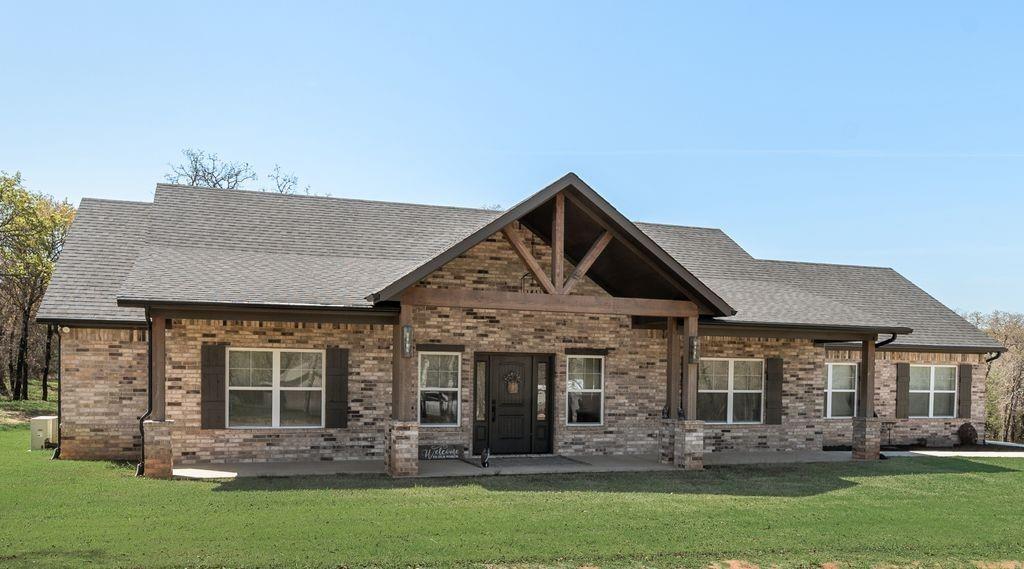Newly constructed pristine and immaculate condition custom built home by H&H Homes in Decatur. This home is absolutely beautifully crafted, fabricated and has all your modern comforts with the country charm on almost 3 acres of Texas Tranquility! This home is located in a master planned sought after community of Rolling Hills. This home is built with style and pizazz! The Open Floor plan is fantastic with 10 foot ceilings, amazing wood look ceramic tile through out the home for ease of cleaning and cut down on allergies! The living room and area is large with a gas burning stone fireplace with custom made mantle and fire box and is a piece of artwork center piece! The kitchen in this home is absolutely stunning! It has custom leathered black granite counter tops, amazing quartz custom back splash, custom cabinets with over lighting, inset lighting and under the counter lighting for that luxurious feel, butcher block island, gas cook top for your inner chef, pot filler, custom vent hood, and an oversized butler's pantry built for an aspiring home chef! The private primary bedroom suite has tray ceilings, wonderful natural light and a luxurious spa retreat primary bathroom. The secondary bedrooms in this custom built home are large and will provide ample room for your family or guests. The split layout will also provide for your privacy needs as well. The bathrooms in this home are all luxurious and have a spa like feel to them. Now lets get to your nearly 3 acres of treed lot that is a canvas for your creativity! This custom home has a front and rear porch that screams relaxation or entertainment! There is also a prepped pad onsite ready to accommodate up to a 30x40 shop or barn. If you enjoy the outdoors and wildlife you are in the right place! This home has direct access to the LBJ National Grasslands which offers miles of hiking, horseback riding, and out door activities and hunting. This is an amazing opportunity to own a luxurious custom newly built home!
