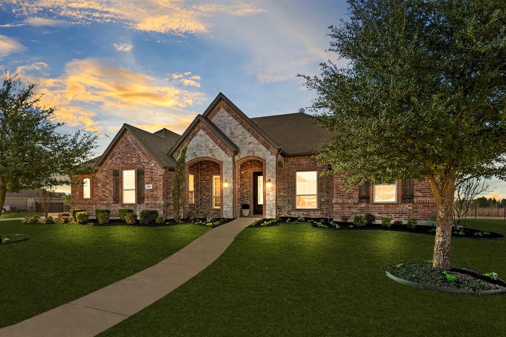 A rare opportunity to own a single story estate in Heath TX offering 4 bedrooms, 4 full baths, a 4 car garage, and over 3,600
square feet of living space on a completely fenced One acre lot. Ideally situated in Rockwall County’s most exclusive address, Heath, Texas, this 2015 custom home is nestled within the prestigious and intimate Villas of Heath, a coveted 10 home community
where properties rarely come to market. Designed for both everyday comfort and elegant entertaining, the open
concept floor plan centers around a light filled great room with soaring ceilings and expansive views of the resort style
backyard. The great room flows seamlessly into the chef’s kitchen, featuring a large eat-in island, double ovens, under
the counter ice maker, and an oversized walk-in pantry. Extensive hardwood flooring extends throughout the great
room and all bedrooms. Every bedroom offers a walk-in closet with custom built-ins, while additional spaces include a
formal dining room, media-game room that could serve as a fifth bedroom, and a true private study with double French doors. The outdoor living area is equally impressive, showcasing a free form pool with custom spa, covered patio, and built-in grill perfectly positioned to overlook the fenced yard and tranquil greenbelt beyond. Additional highlights include two water heaters, a whole
home security system and ADA friendly design elements. Zoned to the highly sought after Lynda Lyon Elementary, Cain
Middle School, and Heath High School, the home is also conveniently located just minutes from the shops in Heath, The
Harbor, historic downtown Rockwall, and major highways including I-20, I-30, and I-80 providing alternate routes to Dallas, the airport and all DFW has to offer.