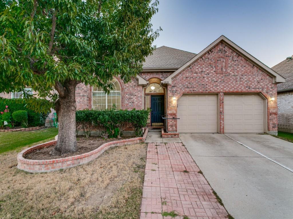 Desirable 1-story home built by Highland Homes! 4 Bedrooms and 3 Full Baths with many updates & improvements! Two ensuites provide family or guests a private bedroom suite separate from other bedrooms.  Wood laminate flooring in Living-Dining. Light & bright with large windows; vaulted ceilings; stunning chandeliers; fresh neutral paint & carpet; lots of closet space!  The Living Room offers a gas-start fireplace with quartz surround & wood mantel.  The Kitchen features white painted cabinetry, gorgeous white Quartz countertops & backsplash, SS sink, commercial style faucet and brand new Whirlpool & GE stainless steel appliances, including French Door refrigerator! Luxe Primary Bedroom with walk-in closet, 2 sinks, garden tub & separate shower with rain shower head. AC unit with warranty installed August 2025. 2 car garage. Private backyard with patio & wood board-on-board fence. Terrific location near Lake Grapevine & just minutes to DFW Airport or Historic Downtown Grapevine. Sought-after Flower Mound schools. Near parks, restaurants & shopping! You'll be happy to call this home!