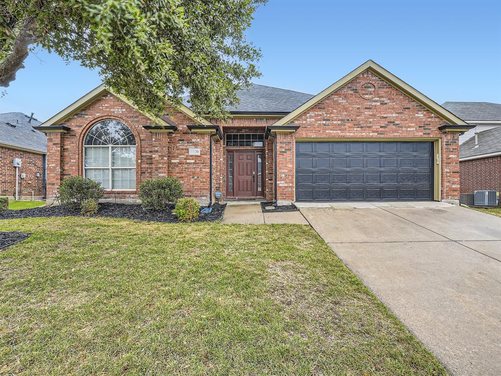 Click the Virtual Tour link to view the 3D walkthrough. Welcome to this lovingly maintained single-story home, ideally situated right near Lewisville Lake! Step inside and be greeted by the spacious, sunlit living room, featuring a cozy fireplace that is sure to become the heart of your home. High ceilings throughout create a welcoming and open ambiance. The charming kitchen is adorned with granite countertops, a convenient breakfast bar, and stainless steel appliances that make cooking and entertaining a breeze. The primary suite is generously sized and offers a private oasis for relaxation. The ensuite bathroom is a true retreat, featuring a large vanity with ample storage space, a garden tub, and walk-in closet. Two additional bedrooms provide plenty of space for everyone, plus a dedicated home office that could easily serve as a fourth bedroom. Notable updates include a new roof, new gutters, a new garage door, and new window screens, providing peace of mind for years to come.