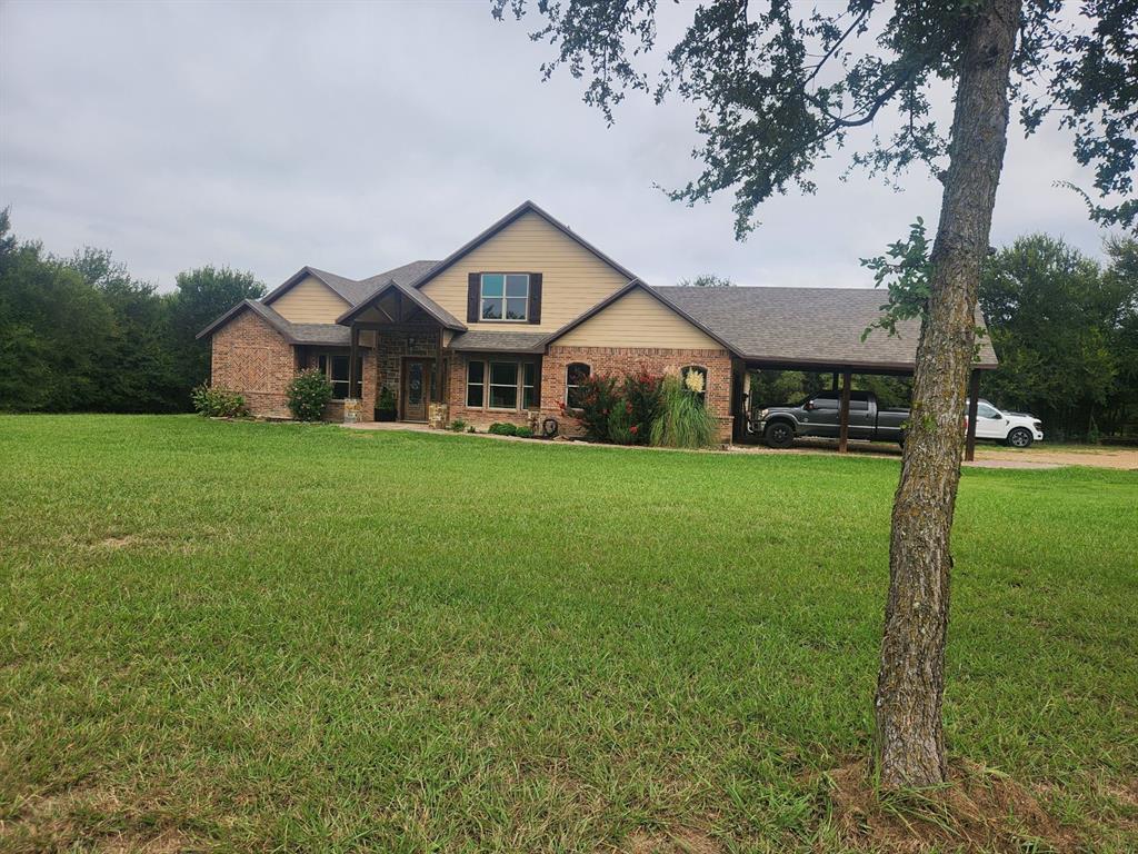 Amazing opportunity to own a beautiful custom home on 22.8 acres. Very secluded & private. Fully fenced with awesome horse barn (50x60) with 5 stalls,30x50 shop with apt & brand new shop (40x30) with carport. Shops are well insulated with elec & water. Home is energy efficient with foam insulation throughout. Awesome floor plan with lovely wood flooring. Master BR & 2nd BR with full bath down. Master BR features French doors to back patio, trey ceiling, fp, walk-in closet, garden tub, large tile shower, sep vanities. Formal dining & custom study. Kitchen, with granite, tons of cabinets, walk-in pantry & beautiful tile floor, opens to spacious LA with fp & wall of windows overlooking large, cov patio & sparkling pool. 3rd BR with full bath & game room upstairs. Addl room off the game room also could be 4th BR. Tankless wh, 10’ dbl mahogany entry doors, decked attic space. Owner is installing new Liftmaster electronic gate at the entrance. New roof, new pool equipment, new tankless water heater. 21.8 acres is currently ag exempt. No restrictions.