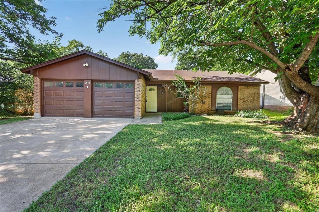 Welcome to this charming 3-bedroom, 2-bath home nestled in an established Watauga neighborhood! Fresh interior paint, new flooring, and thoughtful updates throughout make this home move-in ready while maintaining its character and warmth. The spacious living room features vaulted ceilings with exposed wood beams, creating a striking focal point and an open, inviting atmosphere.

The functional kitchen offers abundant cabinet space, updated countertops, and a sunny breakfast area overlooking the backyard. The oversized primary suite provides plenty of room to unwind and includes an ensuite bath and separate vanity area. Generously sized secondary bedrooms offer flexibility for family, guests, or a home office.

Step outside to a large fenced backyard with covered patio, perfect for entertaining, relaxing, or enjoying Texas evenings under the mature shade trees. Conveniently located near Capp Smith Park, shopping, dining, schools, and major commuting routes including Hwy 377, Loop 820, and I-35W, this home offers the perfect combination of comfort, convenience, and value.