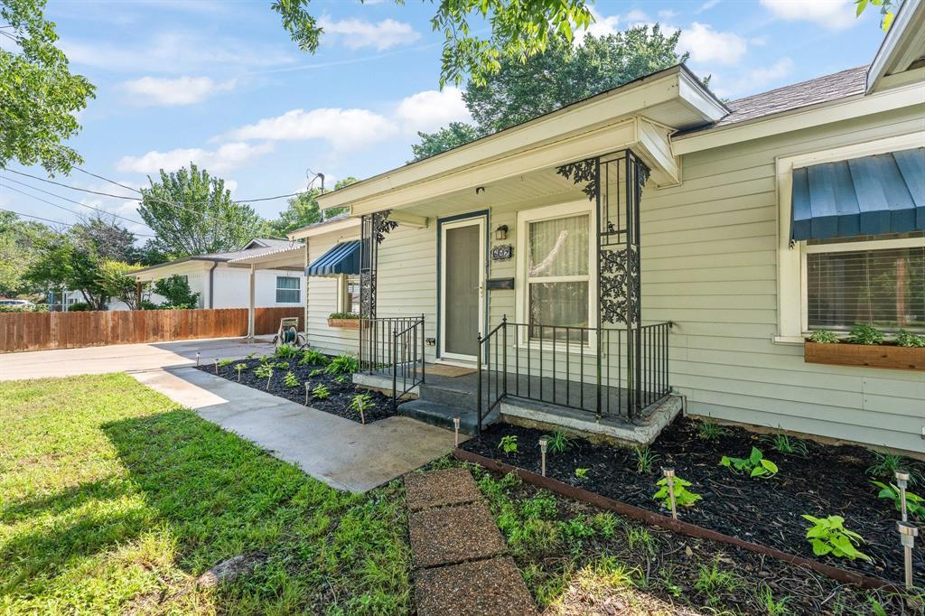 Charming 1940's traditional cottage-style home with timeless character and thoughtful updates. LOCATION, LOCATION, LOCATION!  Beautifully updated home offers the perfect blend of character, comfort, and convenience in a prime location near Downtown Fort Worth and the highly sought-after River District. Situated on a spacious lot with mature shade trees, this property features incredible curb appeal, covered parking, and a large backyard perfect for entertaining, relaxing, or enjoying Texas evenings. Vintage cottage charm, inside, you’ll find gorgeous wood flooring throughout much of the home, abundant natural light, and inviting living spaces full of warmth and personality. The spacious living room showcases custom built-ins and plenty of room for gathering with family and friends. The updated kitchen features granite countertops, subway tile backsplash, stainless steel appliances, gas range, ample cabinetry, and generous prep space. The oversized primary suite is a true retreat with walls of windows overlooking the backyard, creating a peaceful and relaxing atmosphere. Additional bedrooms offer flexibility for guests, office space, hobbies, or growing families. Bathrooms have been tastefully updated with modern fixtures and finishes with a large walk in shower. Step outside to enjoy the private backyard with mature trees, patio space, storage building-workshop with electricity, and plenty of room to garden, play, or entertain. Walking distance to schools and conveniently located near shopping, restaurants, entertainment, Trinity Trails, and major highways for an easy commute. This one combines charm, updates, space, and an unbeatable location all in one!