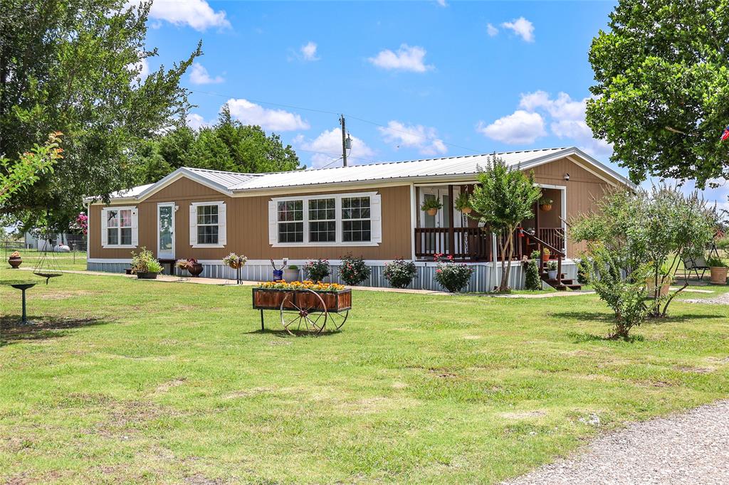 Discover this exceptional 5-acre property in the rapidly growing community of Josephine, Texas, offering incredible potential for investors, developers, or anyone seeking a strategic buy-and-hold opportunity. Comprising two contiguous parcels, this unique site features a well-maintained mobile home, extensive storage structures, and wide-open space for future possibilities. Directly across from the brand-new John R. Godwin Elementary School. A new middle school is scheduled to break ground later this year, further boosting long-term value. Ideal for personal use, leasing, or future redevelopment. This is a rare chance to own land in the path of growth, with built-in value from both current usability and future development potential. Whether you're looking to build, hold, or diversify your portfolio—this site checks all the boxes.