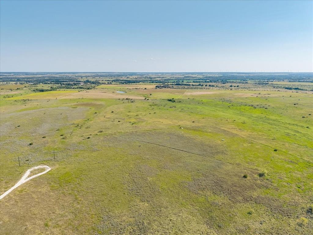 Discover the freedom of wide-open Texas living on this beautiful 30.24-acre tract, known as Lot 14 in the Paloma Vista subdivision, just 20 minutes from downtown Hamilton and near Pottsville. With open pastureland, scenic views, and multiple ideal building sites, this property offers endless flexibility—whether you envision a custom home, barndominium, weekend retreat, small ranch, or a setup that accommodates horses. Electricity is nearby, a water well will need to be drilled, and the land is ready to be shaped to fit your lifestyle.
Equestrian enthusiasts will appreciate the property’s close proximity to Circle T Arena in Hamilton, a premier arena complex known for its two top-quality covered arenas, state-of-the-art facilities, and exciting rodeo and equine events. The complex also features an on-site hotel and steakhouse, making it a standout destination for competitors and spectators alike—all just minutes away.
Hamilton delivers classic small-town charm with friendly people, local shopping, and great restaurants. The 2A Hamilton ISD is recognized for strong academics and competitive sports. Here, neighbors still wave, wildlife is part of the landscape, and the stars shine brightly at night. With plenty of room for outdoor recreation, livestock, or horses, this property offers a rare opportunity to enjoy peaceful country living without giving up convenience. If you’re looking for space, freedom, and versatility, this is the spot—schedule your showing today.