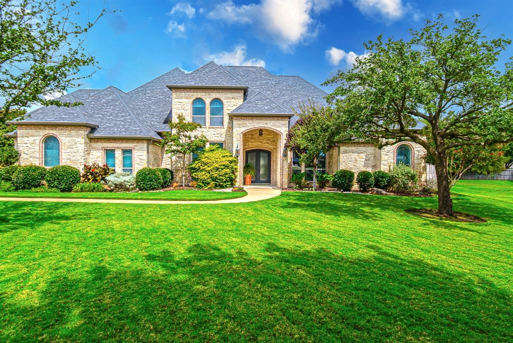 This 4,092 square foot gorgeous home has 4-bedrooms, 3-baths, and a 4-car garage. It sits perfectly on a quiet cul-de-sac on an oversized lot in the gated community of Glen Highlands. Upon walking up to this spectacular home, you're greeted with a gorgeous arched iron and glass double door opening up to a spacious entryway, showing off a large living area, formal dining room, gourmet kitchen with modern finishes such as granite countertops, gas stove with pot filler, an island for prep work, and beautiful cabinetry. The den offers additional space with a gas log fireplace and wood flooring. The dedicated office has wood floors, and built-in custom wood shelving. Retreat to the spacious primary suite with a private bath including a jetted tub and large walk-in closet with built-ins. One of the secondary bedrooms is adjacent to a bathroom that has an exterior door which is ideal for guests, in-laws, multigenerational living or for the future pool access! Additional bedrooms are upstairs, along with a bonus room or game room. Enjoy peaceful evenings on the covered porch, overlooking the inviting outdoor space with plenty of room for a pool for both entertaining and everyday living. This home is a true gem in a sought-after location! Extras include vaulted ceilings, wood flooring, wainscoting, impressive baseboards, decorative lighting, elegant crown moldings throughout, and CHARM that not many homes have these days. NO CITY TAXES! Midlothian ISD! Sprinkler system in entire yard. Updates include new roof installed in 2025; exterior paint in 2025.