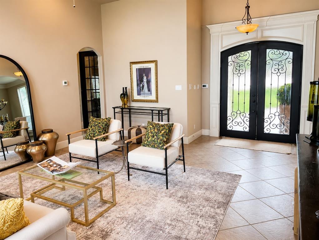 Let's address the elephant in the room-yes, this property has been on the market longer than expected. But that means you have a second chance to see what others may have overlooked! If you've been waiting for exceptional space, quality, & value, this could be the opportunity you've been hoping for! Nestled on a quiet cul-de-sac in the desirable gated community of Glen Highlands, this stunning 4,092-square foot home offers 4 bedrooms, 3 baths, & an oversized 4-car garage on a spacious lot. This home features two generous living areas, two dining areas, & a beautifully appointed gourmet kitchen complete with gas cooktop, pot filler, center island, abundant custom cabinetry & modern finishes. The inviting family room showcases rich wood flooring & a cozy gas log fireplace, while the dedicated home office features hardwood floors & custom build-in wood shelving. The spacious primary suite is a true retreat with a luxurious ensuite bath offering a jetted tub, separate shower, & a large walk-in closet with built-ins. A downstairs split secondary bedroom is conveniently located next to a full bath with exterior access, making it ideal for guests, multigenerational living, or future pool access. Upstairs, you'll find additional bedrooms plus an expansive bonus room large enough for a pool table, media area, or game room. Step outside to the covered patio overlooking the oversized backyard with ample room to build the pool of your dreams! Throughout the home, you'll appreciate vaulted ceilings, elegant crown molding, decorative lighting, wainscoting, impressive baseboards, & the timeless character that's increasingly difficult to find in newer homes. Additional highlights include NO CITY TAXES, MIDLOTHIAN ISD, a full-yard sprinkler systems, new roof & exterior paint in 2025. Come see this remarkable home for yourself. You may leave wondering why it took so long for someone else to recognize what you've just found!