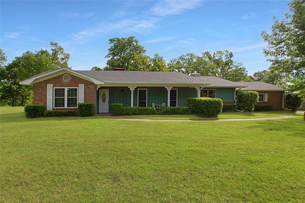 Welcome to this spacious 3-bedroom, 2-bath home offering 2,738 square feet of comfortable living space with a 3-car carport, all set on 3.860 beautiful acres in Bullard. With a large yard, whole-house generator, bonus and or game room, and thoughtful features throughout, this property offers the space and flexibility to truly make it your own.

As you arrive, you’re greeted by a wide-open front yard that sets the tone for the property’s peaceful setting. Inside, the home features two separate living areas, giving you plenty of room to spread out. The main living area is spacious and centered around a beautiful fireplace, while the second living area offers a cozier feel with a brick-surround fireplace—perfect for relaxing or entertaining.

The kitchen is impressively sized and can easily double as a dining space, offering abundant cabinet storage and plenty of room for gathering. All bedrooms and bathrooms are nicely sized, providing comfort and versatility. The primary suite is especially roomy, featuring direct access to the backyard and an ensuite bath with a separate shower and soaking tub.

Step outside to enjoy a covered back patio overlooking a large backyard with plenty of room to roam, play, or host gatherings. The property also includes a storage shed for added convenience.

With its acreage, multiple living spaces, and standout features, this home is a great opportunity to enjoy country living with room to grow.