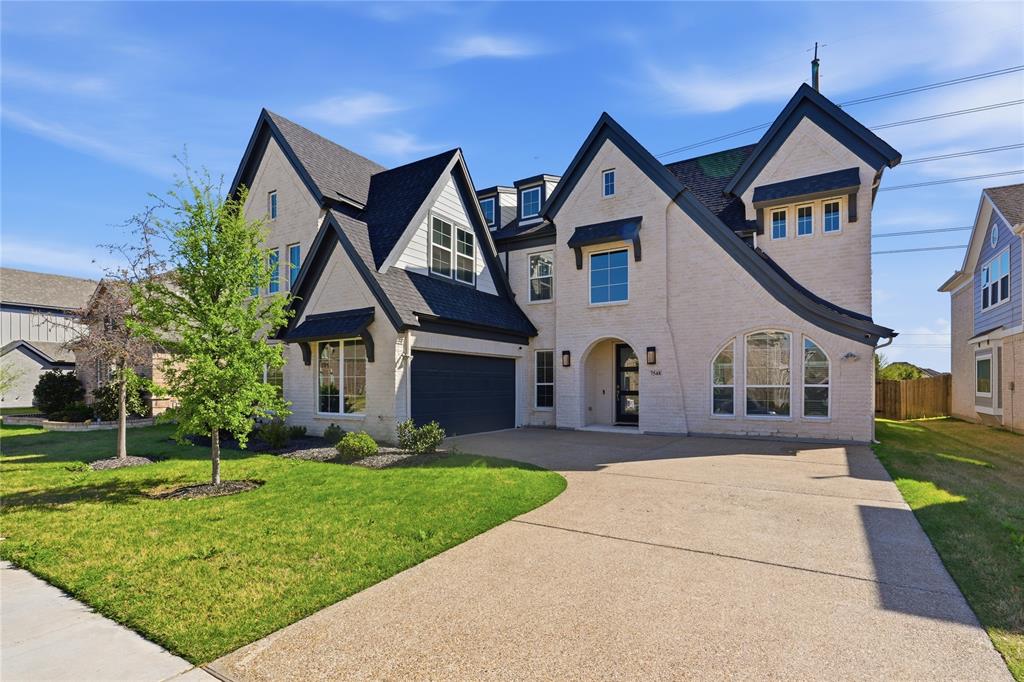 Located in Cedar Ridge Estates and zoned to Mansfield ISD, this stunning Grand Homes residence offers approximately 3,800 square feet of thoughtfully designed living space that blends modern luxury with high-end functionality. The home features 5 spacious bedrooms and 5 full bathrooms, a rare and highly desirable layout that offers greater convenience and flexibility compared to many competing homes in the neighborhood. A two-car garage and an expansive open-concept floor plan create both everyday comfort and an ideal setting for entertaining. At the heart of the home is a dramatic chef’s kitchen anchored by an oversized waterfall-edge marble island, complemented by designer lighting and premium finishes throughout. The main living area seamlessly connects to the covered patio through a full sliding glass wall, creating a true indoor-outdoor living experience. A custom painted black architectural ceiling beam adds a striking design element, while upgraded stair railings elevate the overall aesthetic beyond standard builder selections. The home is designed for both entertainment and relaxation, featuring a dedicated wine cellar, a private theater room, and a spacious game room or secondary living area that offers additional space for gatherings or family activities. Smart home technology is integrated throughout, including a whole-home multi-zone audio system with app-based control. Built-in speaker zones serve the main living area, secondary living space, game room, and outdoor patio, delivering seamless sound throughout the home. Motorized interior window treatments in the dining room and primary suite, along with motorized exterior patio shades, provide added comfort, privacy, and sun control. The exterior showcases exceptional curb appeal with a white brick elevation, bold black trim accents, and an upgraded black roof, creating a striking modern architectural presence. A rare opportunity to own a standout luxury home in one of the area’s premier communities.
