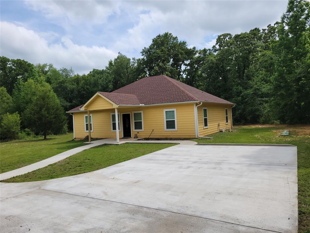 Built and ever occupied, this like-new home sits on FOUR acres with highway frontage. Designed for both comfortable living and flexibility, the property offers excellent potential for a live-work setup or home-based business. Ample space for a shop, equipment, RVs, trailers, additional parking, or future expansion. Modern construction provides the benefit of lower maintenance and energy efficiency. Convenient access and outstanding exposure make this property ideal for a variety of residential or business-related uses.