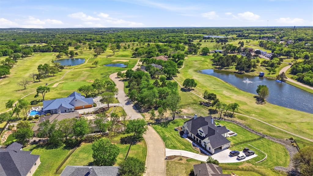 RARE OPPORTUNITY TO LIVE ON THE GOLF COURSE JUST 5 MINUTES FROM LAKE MARINA AND RESORT! Build your dream home on lot 37 in the gated Eagle Chase of Tanglewood subdivision. Unique lot with 14th green in front yard, and beautiful views of the 18th fairway and golf course lake and fountain view from the backyard. The sun sets over the golf course lake from your backyard view with stunning sunset views with marina tower in the background. Just 5 minutes away from the Tanglewood Resort featuring lodging, fine dining, a spa and a marina. 3 new large estates homes recently built across the street and adjacent to Lot 38. Lot 38 directly adjacent to Lot 37 also available for purchase from same owner. Super low tax rates compared to surrounding areas.