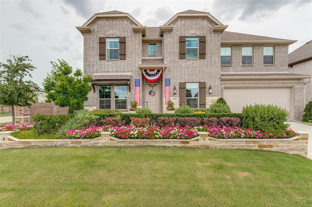 Welcome to the former K. Hovnanian model home, the stunning Mykonos plan, where luxury design and thoughtful upgrades come together in an exceptional setting, zoned to highly sought after Walnut Grove High School in Prosper ISD. Showcasing a striking architectural elevation and designer finishes throughout, this exceptional home offers 4 spacious bedrooms, 3.5 bathrooms, a private office, and beautifully curated living spaces designed for both everyday comfort and effortless entertaining. The open concept floor plan features two expansive living areas and two dining spaces, creating the perfect balance of function and style. The chef’s kitchen impresses with quartz countertops, premium Café appliances, a gas cooktop, abundant cabinetry, and elevated designer details that reflect its model home pedigree. Decorative lighting throughout adds warmth and sophistication, while oversized windows fill the home with natural light. The private office offers an ideal work from home space, and the thoughtfully designed layout provides both open gathering spaces and quiet retreats. The epoxy finished 3 car tandem garage offers ample space for vehicles, storage, or hobbies.
A rare opportunity to own a former model home loaded with premium upgrades in a prime location with top tier schools and an exceptional lifestyle.