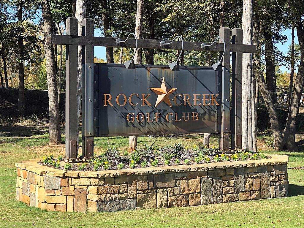 Beautiful large interior lot located in the Toscana subdivision, the highest area in the resort. Current lot views include 12th & 13th greens and pond.  Potential lake view in the winter months.  Rock Creek Resort on Lake Texoma is steadily gaining in popularity.  Don't miss out on this opportunity to own a lot in the gorgeous 1300 acre resort.  Price includes membership fee to Rock Creek Golf Club.  No required build date.  Beautiful Nicklaus designed golf course ranked 19th in TX by Texas Outside.  Onsite restaurant, marina, salt water pool, tennis-basketball-pickle ball court and fitness center. Top rated Cross Timbers hiking trail runs through the community.  Gated, with 24 hour security.  Marina has ship store, boat rentals, slips and guided fishing trips.  60 minutes north of DFW.