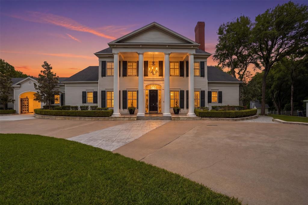 Welcome to an extraordinary private estate where Southern charm meets refined luxury, set behind a gated entry on 3.16 breathtaking acres. Framed by sweeping views of a picturesque horse ranch, this property offers a rare blend of serenity, sophistication, and resort-style living.
The main residence features 4 spacious bedrooms, 4 full baths, and 2 half baths, thoughtfully designed with multiple living areas. A detached guest house provides an additional bedroom and full bath—perfect for visitors, extended stays, or private retreats.
Inside, impeccable craftsmanship and convenience come together seamlessly. The home is fully equipped with Savant smart lighting, while brand-new hardwood floors flow throughout. The primary suite is a true sanctuary, complete with heated bathroom floors, a steam shower, and a custom-designed closet.
At the heart of the home, the chef’s kitchen is nothing short of spectacular—featuring a built-in Miele coffee system, Sub-Zero refrigeration, a Wolf gas range, a butler’s pantry, and a beautifully redone wine room. Entertain effortlessly with both a wet bar and dry bar, each outfitted with refrigerated drawers and ice makers.
Step outside to your own private resort. The Hampton-style pool is complemented by a charming cabana, fire pit, and an expansive outdoor kitchen equipped with a gas grill, Big Green Egg, griddle, and dishwasher—perfect for hosting unforgettable gatherings. Multiple patios and terraces create inviting spaces to relax and take in the tranquil surroundings.
Additional highlights include a tennis court (also updated in 2015), abundant storage throughout, and a versatile garage accommodating three cars plus a separate bay ideal for a boat. An attached office or workshop space within the garage adds even more flexibility. Two laundry areas—one upstairs and one downstairs—provide convenience for daily living.
This remarkable estate delivers the ultimate in privacy, luxury, and lifestyle.