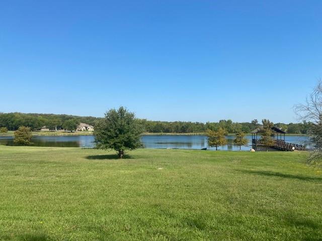 Come build your dream home in this exclusive, restricted subdivision with mature trees and a 7 acre lake. Golf cart path to Sulphur Springs Country Club is next to lot 23. Only minutes from I-30 and downtown Sulphur Springs.