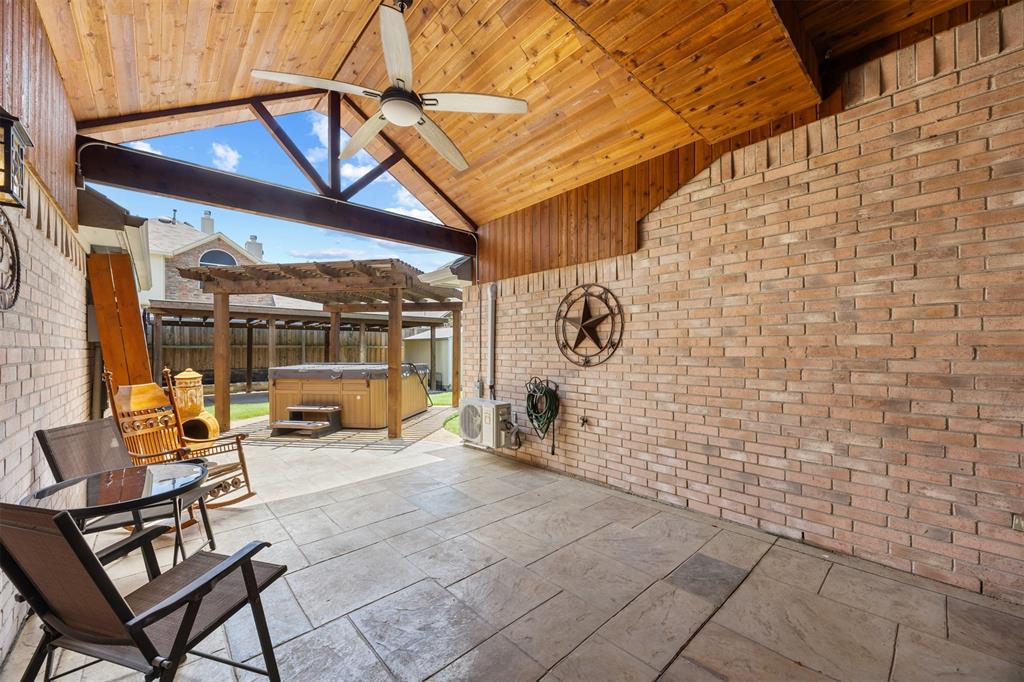 SELLER'S PREF LENDER IS OFFERING 2-1 RATE BUYDOWN WITH ACCEPTABLE OFFER. Contact listing agent for contact details. Exceptional quality, thoughtful upgrades, & incredible outdoor living come together in this beautifully crafted Dallas Interior Designer home. Recent improvements totaling tens of thousands of dollars provide peace of mind, including premium Anlin Del Mar energy-efficient windows installed (2025) with a transferable warranty, new water heater with expansion tank, new dishwasher, smart thermostat, water pressure regulator valve, upgraded lighting with dimmers, & fresh interior-exterior paint (all in 2024). The primary suite features a dedicated mini-split AC system for personalized comfort and energy efficiency. Inside, you'll appreciate the wood-look tile flooring throughout, creating a seamless & low-maintenance living space. The fully upgraded gourmet kitchen offers both style & functionality, while the renovated primary and secondary bathrooms showcase quality finishes and thoughtful design. The spacious family room is equipped with surround sound, making it ideal for entertaining, movie nights, or everyday living. Step outside to a backyard designed for relaxation & enjoyment. The extended covered patio provides ample space for outdoor gatherings, while the pergola & hot tub creates the perfect private retreat. Additional exterior features include a full-yard sprinkler system with foundation drip irrigation, backyard storage shed, & an oversized covered carport with rolling gate that can accommodate a boat, truck, or extra vehicles. Security & convenience are top priorities with a comprehensive alarm system, Ring video doorbell, garage camera, motion-activated lighting, fiber internet availability, 24 inches of attic insulation for enhanced energy efficiency. This move-in-ready home has been meticulously cared for & thoughtfully updated, offering a rare opportunity to own a property where the major improvements have already been completed for you.