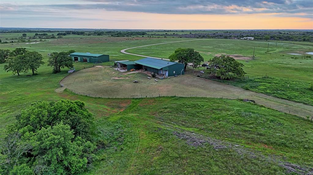 The Chisholm Trail Ranch is 327 +- acres approximately one mile from the Red River, located alongside the historic Chisholm Trail in Montague County. This property is ideal for recreational hunting and fishing, running cattle, hay production, or building your dream home. The dependable surface water combined with wooded terrain creates a native wildlife habitat and provides some of the best hunting in north Texas. The sunset views are hard to beat on this ranch. This ag exempt 327 +- acre ranch features a combination of open improved pasture for livestock grazing and hay production, as well as wooded terrain for hunting. The property is fenced and cross fenced, includes multiple barns, pipe corrals and divided pastures with gated entrances. There are drivable trails throughout the property. Coastal Bermuda and native grasses thrive on this property. There is electricity, and a water well. The ranch features 9 ponds for livestock, wildlife, and recreational activities.