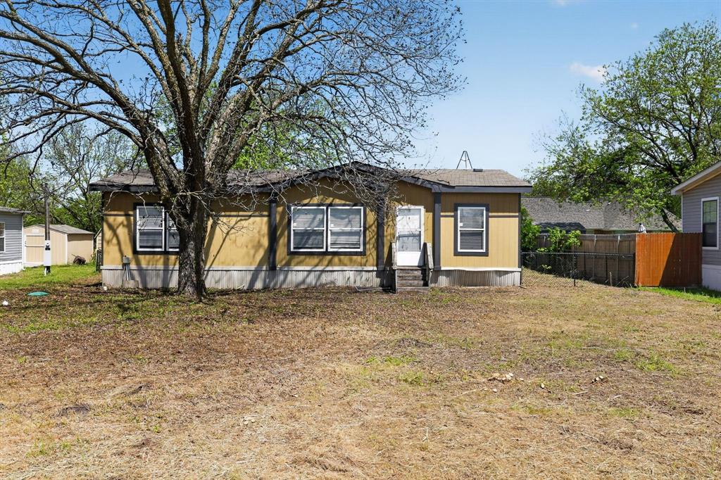 Experience the charm of country living with modern farmhouse style in this move-in ready home located in Farmersville. Built in 2019, this well-maintained 3-bedroom, 2-bath double-wide manufactured home offers 1,440 square feet of thoughtfully designed living space on a .20-acre lot.

Step inside to an inviting open-concept layout featuring stylish finishes, a decorative barn door, farmhouse kitchen sink, and plenty of room for everyday living and entertaining. The spacious primary suite provides a relaxing retreat with a garden tub, double vanity, and ample storage.

Outside, enjoy the freedom of your own outdoor space with room to garden, entertain, or create the backyard you've always wanted. Combining comfort, style, and affordability, this property offers the perfect opportunity for first-time buyers, downsizers, or anyone looking to enjoy a peaceful setting without sacrificing modern conveniences.

Conveniently located with easy access to Farmersville, Princeton, and McKinney, this home delivers the best of small-town charm and everyday convenience. Don't miss your chance to own this beautiful farmhouse-inspired home—schedule your showing today!