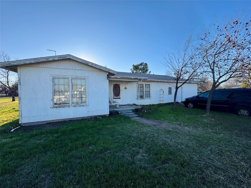 This generously sized 3-bedroom, 2-bath home situated on a double city lot in the heart of Hawley, Texas. Offering approximately 1,770 square feet, this property features two separate living areas, providing flexible space for entertaining, relaxing, or working from home. The kitchen and dining area flow naturally into the family room, while original hardwood floors add character throughout much of the home. The converted garage serves as a versatile shop or workspace. Located 20 minutes from the OpenAI Data Center in Abilene and 40 minutes from the two Google data centers in Haskell, this property presents strong potential as a workforce rental.