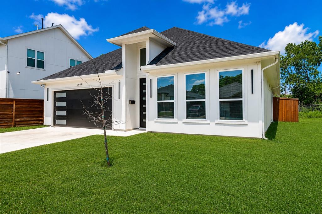 Never lived in - TRUELY A GEM!!! This extraordinary Custom Built Residence presents the rare luxury of dual primary master bedrooms, each with expansive walk-in closets and private en-suite bathrooms. It includes a massif main master bedroom, The main suite is adorned with tasteful accent walls and tray ceilings, while the secondary suite also features accent walls and a spacious walk-in closet. Main master bedroom has a free standing tub, Master bedroom has an attached office.  Throughout the home, you'll find large format tile flooring, a stunning fireplace, custom wood cabinetry, accent walls, ceiling fans, 8-foot doors, and an ultra-modern design that creates a welcoming ambiance. An in-person visit is essential to fully appreciate this property, as photos alone don’t capture its remarkable appeal. Located in the vibrant Trinity Groves area of West Dallas and just minutes from downtown, medical district and arts district, it sits within the sought-after Singleton,Hampton, and Canada triangle. Plenty of natural light from its 6-ft windows, the home also features an impressive 8-foot mahogany front door.Every element has been meticulously selected, from upgraded granite countertops,faucets, and elongated toilets to exquisite lighting, a contemporary garage door, and exceptional exterior illumination.Too many upgrades to list, this is truly a home to be proud of! Walking distance to Singleton avenue where all the restaurants and entertainment is located. Priced for Quick Sale!