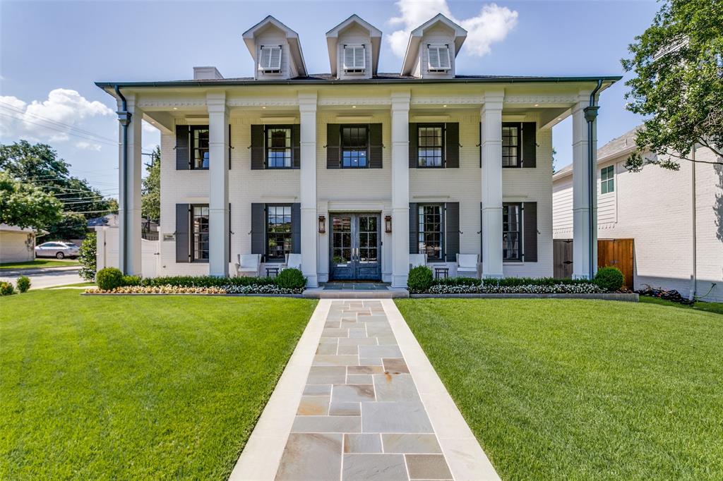 Gorgeous, classic traditional home, beautifully updated on a corner lot walking distance to Boone Elementary! The fabulous front porch welcomes you into the spacious two story foyer with a formal dining room on one side and a gorgeous living room on the other. The chef's kitchen is equipped with top of the line appliances, quartz counter tops and an inviting island. The kitchen is open to an expansive family room that opens to the newly refreshed backyard with turf and outdoor fireplace which is perfect for family time or for entertaining. A rear staircase leads to the private 5th bedroom which has its own full bathroom and could also be used as a flex space for work, play or fitness. The front staircase leads to the other four bedrooms including the primary. This home had designer touches throughout, is move in ready and perfect for any family!