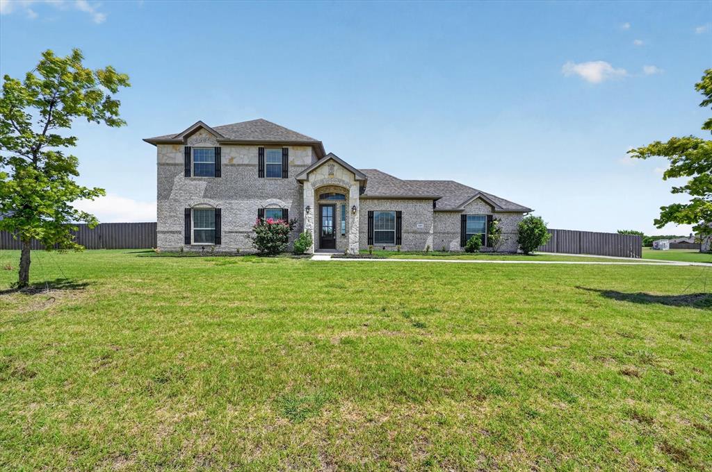 Welcome to your dream home on an oversized 1 acre lot! This stunning 4 bed 2.5 bath residence offers an abundance of natural light, upgrades, and a host of other custom designed features. This beautiful 2020 built home boasts low maintenance wood-look tile flooring throughout living areas, new carpet in bedrooms, and fresh paint. The spacious open concept chef's kitchen features stainless steel appliances, a large island, and shaker cabinetry. A covered back patio offers views of your expansive 1 acre lot, with lots of space to spread out and call your own. Schedule a showing today!