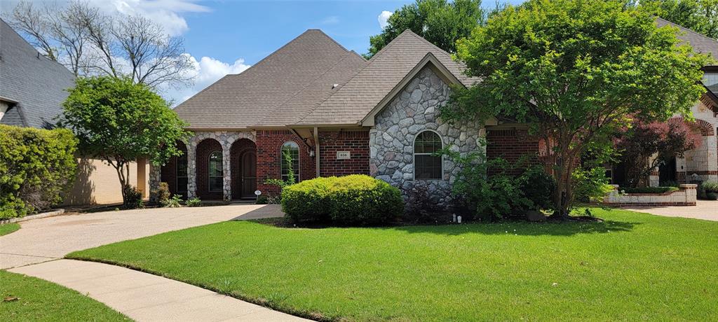 This beautiful executive home on the highly rated Southern Oaks Golf Course is available for immediate move-in. The living area features a rock accent wall with gas fireplace, built-in television with soundbar and subwoofer, built-in bookshelves, and a wall of windows overlooking the golf course. The kitchen boasts granite countertops, custom cabinets, an island, a double oven, and a walk-in pantry. The second living area features columns and arches and could be used as a formal dining area. The tranquil primary bedroom features a double tray ceiling, a bay window sitting area with golf-course views, and a large walk-in closet. The primary bath has a deep jetted tub, separate vanities, and dual shower heads. The third bedroom would be better suited as a study, but it does have a closet. You'll enjoy views of the 17th green and the 18th tee box from the large covered back porch and spacious patio. This home is perfect for entertaining!