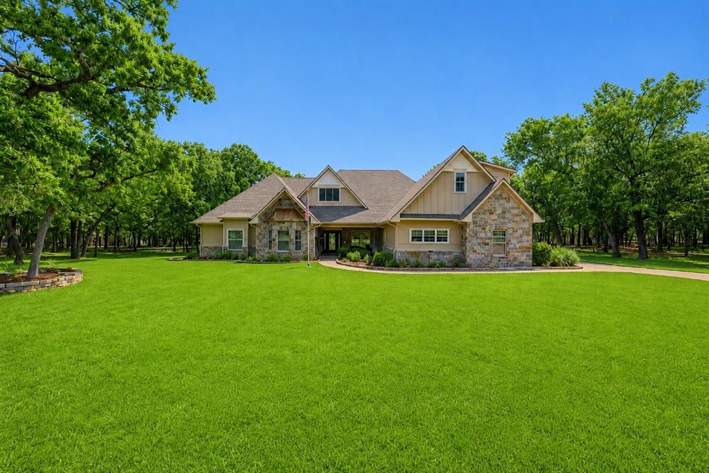 Welcome to life on Lake Athens! Nestled in the highly sought-after Oakwood subdivision, this spacious 4-bedroom, 3-bath home offers 3,391 square feet of thoughtfully designed living space on an oversized half-acre lot. While not waterfront, the property is just a short walk or golf cart ride from the lake and all the amenities that make Oakwood one of Lake Athens’ most desirable communities. Residents enjoy access to a community pool, pickleball courts, clubhouse, private boat ramp, fishing pier, and boat slips, creating the perfect setting for an active lake lifestyle. This is truly a golf cart community where neighbors know each other, gather regularly, and enjoy everything lake living has to offer. 
Inside, you’ll find generous room sizes, abundant storage, and flexible spaces designed to meet a variety of needs. The private upstairs retreat features a large flex room and a full bath, making it ideal for a game room, media room, guest quarters, or multigenerational living. The primary suite is a standout, offering dual walk-in closets along with a secure storage closet for valuables, seasonal items, or personal belongings. Storage continues throughout the home, including an oversized spray-foam insulated attic with walk-in access and extensive decking—perfect for keeping items organized and easily accessible. 
Whether you’re looking for space to entertain, room for family and guests, or simply a place to enjoy the relaxed pace of lake community living, this Oakwood home delivers the best of both comfort and lifestyle just moments from beautiful Lake Athens.
(New carpet in bedrooms, fresh paint, sod, and roof replaced in 2024.)