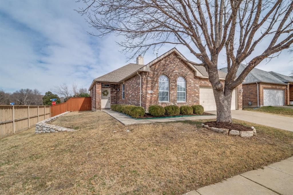 Welcome to this beautifully maintained east-facing brick home nestled in a quiet residential enclave. This move-in ready residence offers timeless curb appeal with manicured landscaping, a spacious 2 car garage, and a welcoming entryway.

Inside, the open concept layout features a U shaped kitchen with stainless steel appliances, built-in microwave, double-basin sink, and abundant cabinetry. Light countertops and a tiled backsplash complement the neutral ceramic flooring. The kitchen flows seamlessly into a tiled dining area with chandelier lighting and a carpeted living space anchored by a fireplace with tile surround and a recessed niche, perfect for cozy evenings or elegant entertaining.

Multiple bedrooms offer ceiling fans, natural light, and neutral finishes, while bathrooms include a double-sink vanity, glass-enclosed shower, soaking tub beneath a decorative window, and a secondary bath with tiled shower and tub combo. A dedicated laundry room with built-in cabinetry and utility hookups adds everyday convenience. 

The entryway features tall windows and a stylish light fixture for added charm. Upstairs and downstairs layouts provide flexibility for multi-generational living or guest privacy.
  
Outdoors, enjoy a well maintained backyard with privacy fencing, a concrete patio, and lush green lawn, ideal for weekend lounging or evening BBQs. 

The rear entry garage includes a visible address plaque for added character. Located minutes from parks, trails, and community amenities, this home blends comfort, functionality, and location. HOA permits rentals.  Please confirm directly with the HOA for the most current guidelines.