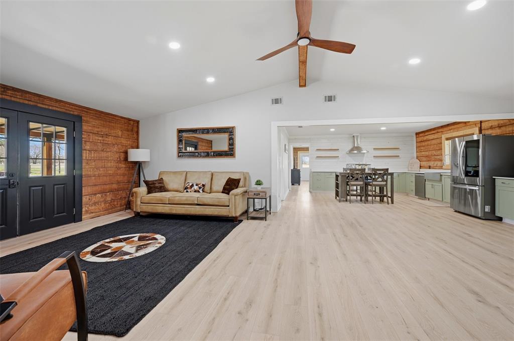 Welcome to 230 Frosty Hollow Rd in Denison—a beautifully renovated, move-in ready home on 3 acres. Featuring 2,700 square feet with 5 bedrooms and 3 full baths, this thoughtfully designed property combines comfort, privacy, and flexibility, making it ideal for multi-generational living, entertaining, or simply enjoying room to spread out. Inside, you’ll find spacious living areas, warm wood accents, abundant natural light, and updated finishes throughout. Outside, mature trees, open space, and a private nature trail winding along the back of the property create a peaceful retreat with endless possibilities for outdoor living, hobbies, or recreation. Conveniently located near Sherman, Denison, and Lake Texoma, this property offers the charm of country living with easy access to shopping, dining, and entertainment. Recent price improvement makes this an exceptional opportunity for buyers seeking acreage, character, and value. Extra Room for the entire Family.